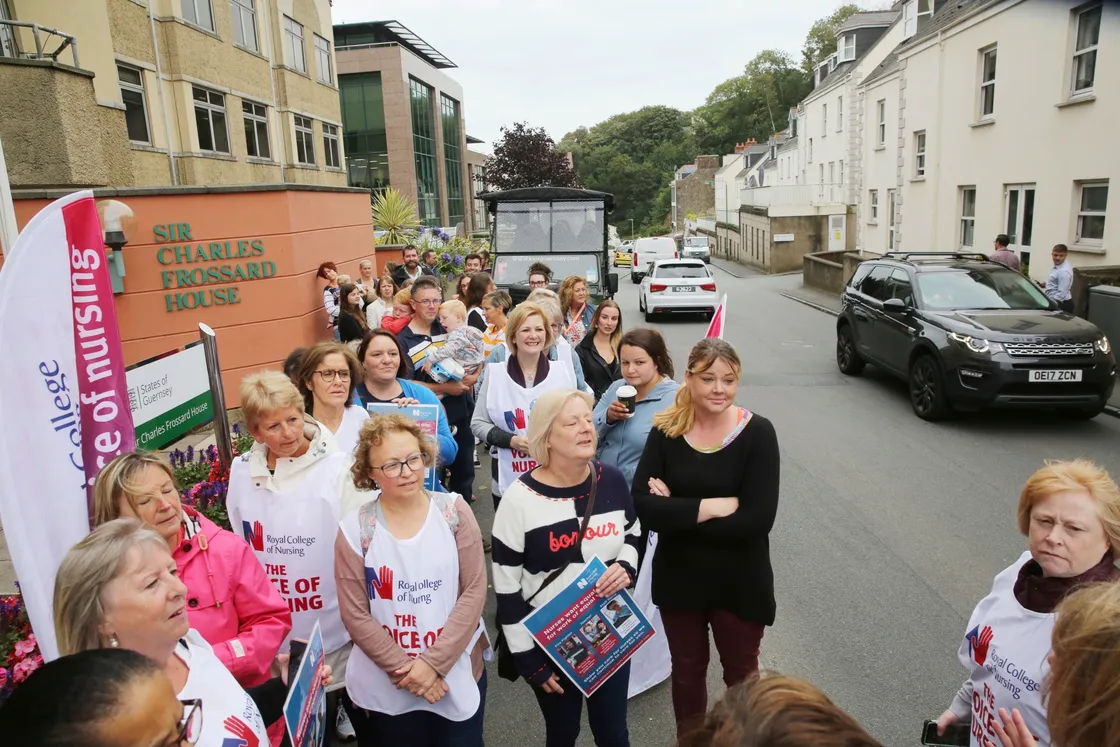 Pic by Adrian Miller 15-08-19 .Frossard House.Members of the Royal College of Nursing hand over a petition over to Deputy Jane Stephens over pay negotiations.. (25515466)