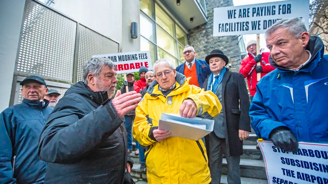 Deputy Peter Roffey accepts the petition from Guernsey Boatowners Association president Nick Guillemette. (Picture by Peter Frankland, 33863273)