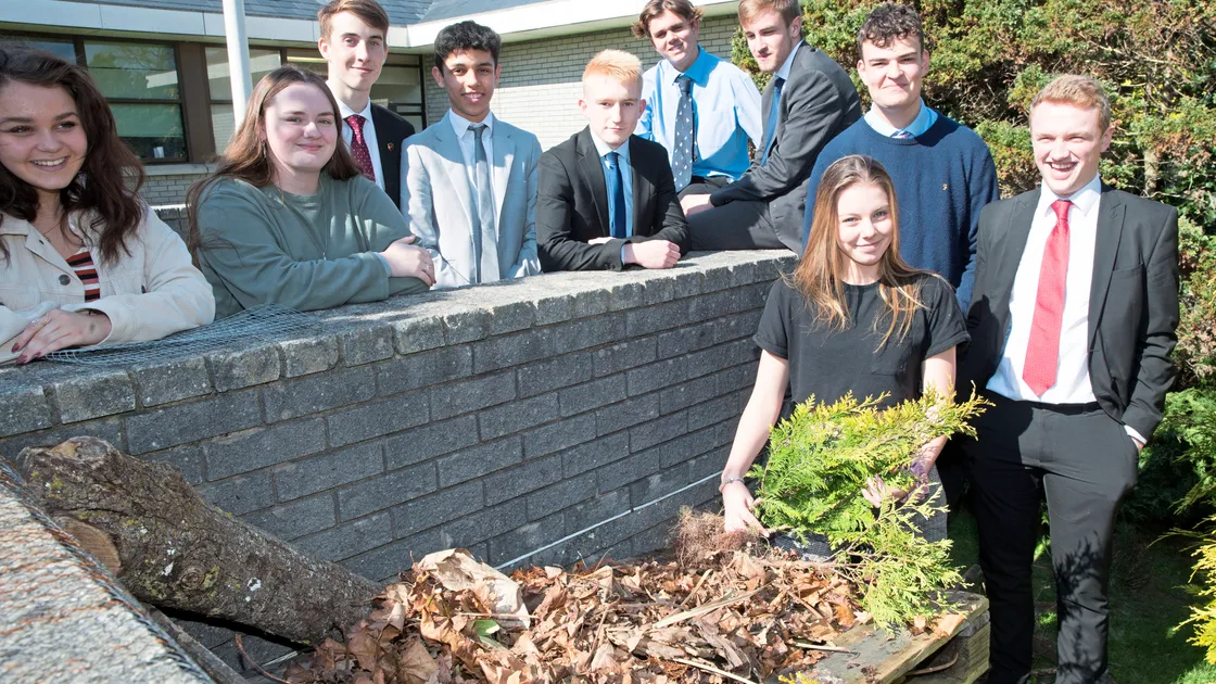 Grammar School students who are part of environmental group pictured next to the bug hotel they are building. Left to right, Fern Nicholson, Sorcha Todd, Ethan Falla, Bilal Assif, Lucas Ozanne, Noah Whitmore, Kieran Creber, Izzy Gaudion, Kristian Allen and Matthew Casey. (Picture by Adrian Miller, 24244736)
