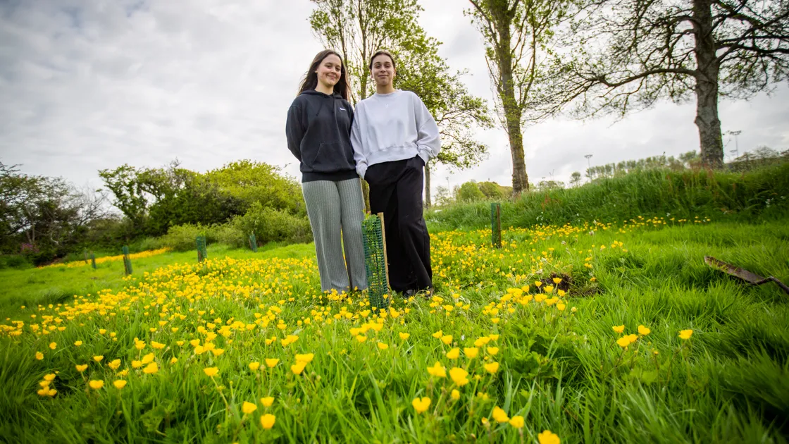 Guernsey Grammar School Sixth Form Centre IB students have been planting trees inspired by the Queen’s Canopy. Maddy Roussell, left, and Joni Lowe, both 17, have enjoyed the morning outside doing an activity that will make a difference to the environment. (Picture by Sophie Rabey, 32120201)