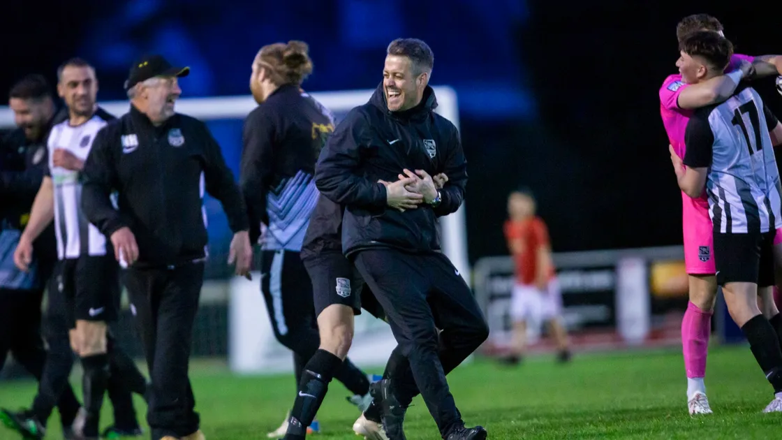 Joyous Saints players, coaches and officials rush onto the pitch at the final whistle at Blanche Pierre Lane.  (Picture by Sophie Rabey, 29569881)