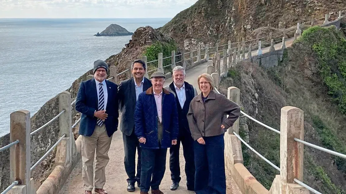 A delegation from the Commonwealth Parliamentary Association on the Coupee during a visit to Sark. Left to right, Paul Armorgie from Chief Pleas, CPA Secretary-General Stephen Twigg, Greffier of the Guernsey and CPA Guernsey branch secretary Simon Ross, CPA Small Branches network vice-chairman Deputy Adrian Gabriel and Sarah Dickson, regional secretary for the CPA British Islands and Mediterranean Region. (34421478)