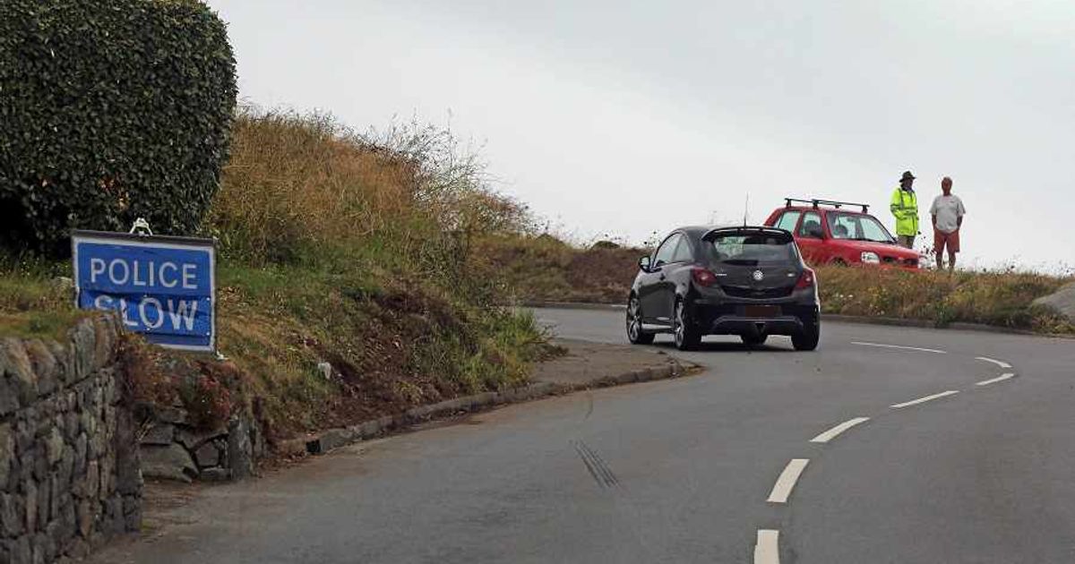 Two die as car crashes onto rocks