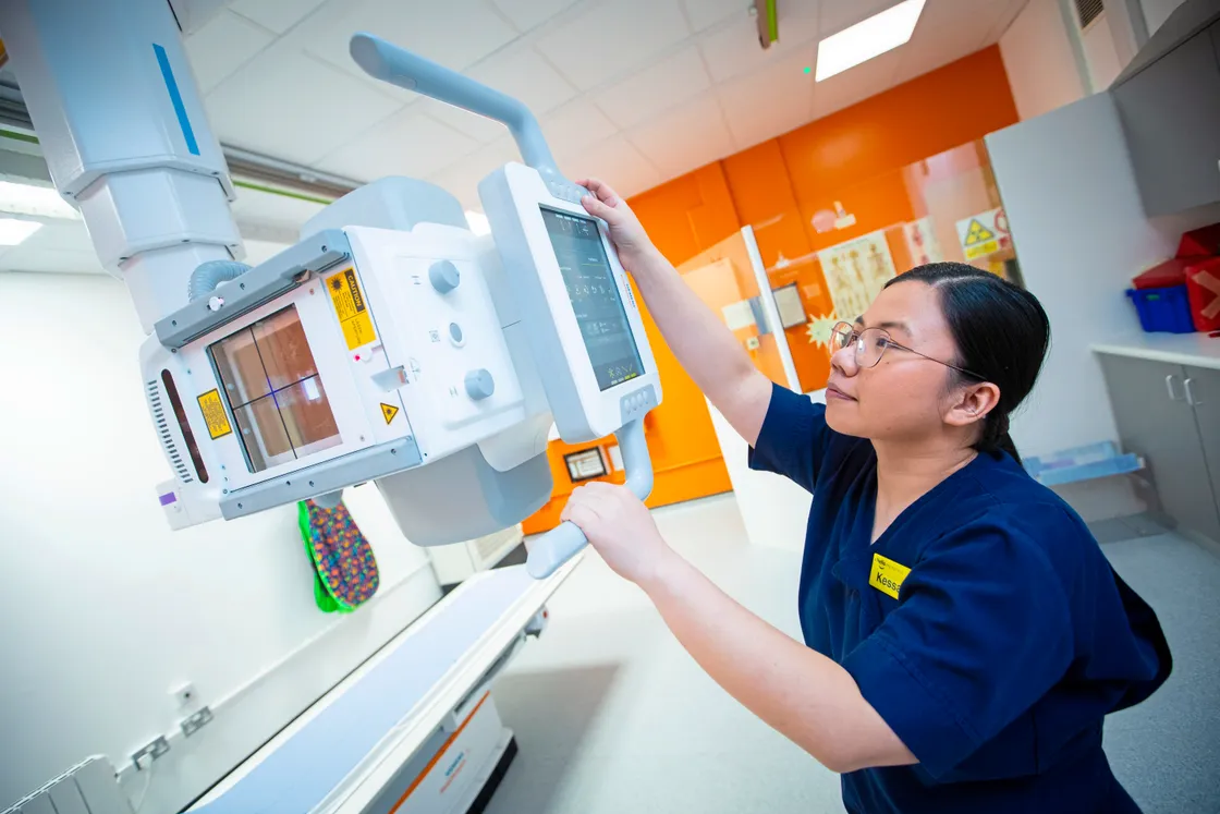Radiographer Kessah Sombero gets to grip with the new x-ray equipment.  (Picture by Peter Frankland, 32933237)
