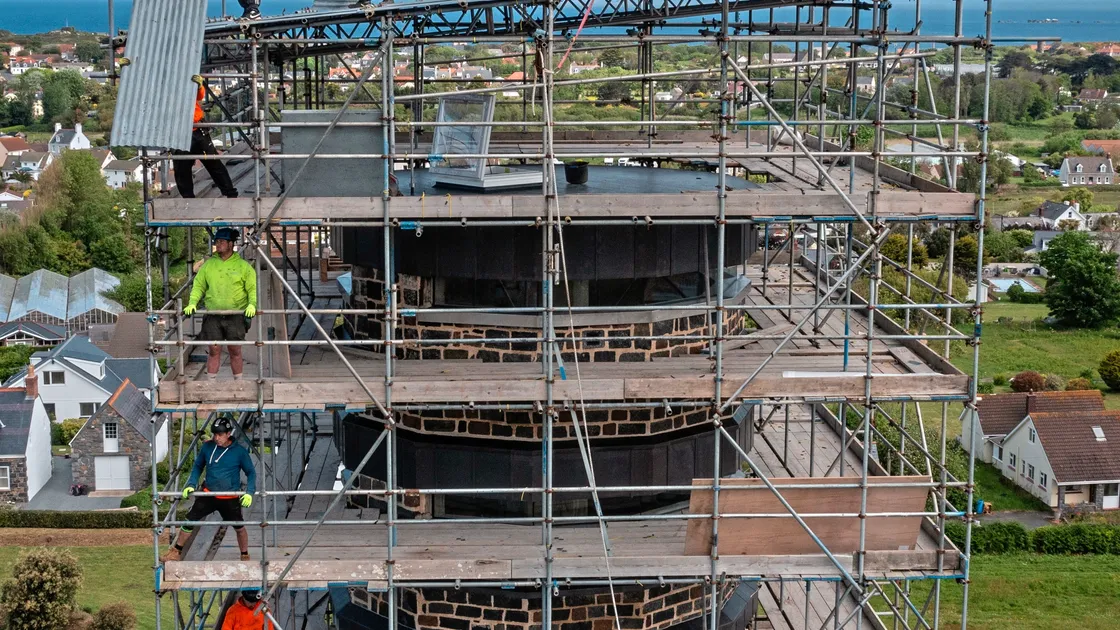 The scaffolding around Vale Mill is being taken down and is expected to take around four weeks. James Ridout is top right.. (Picture by Peter Frankland, 33241741)