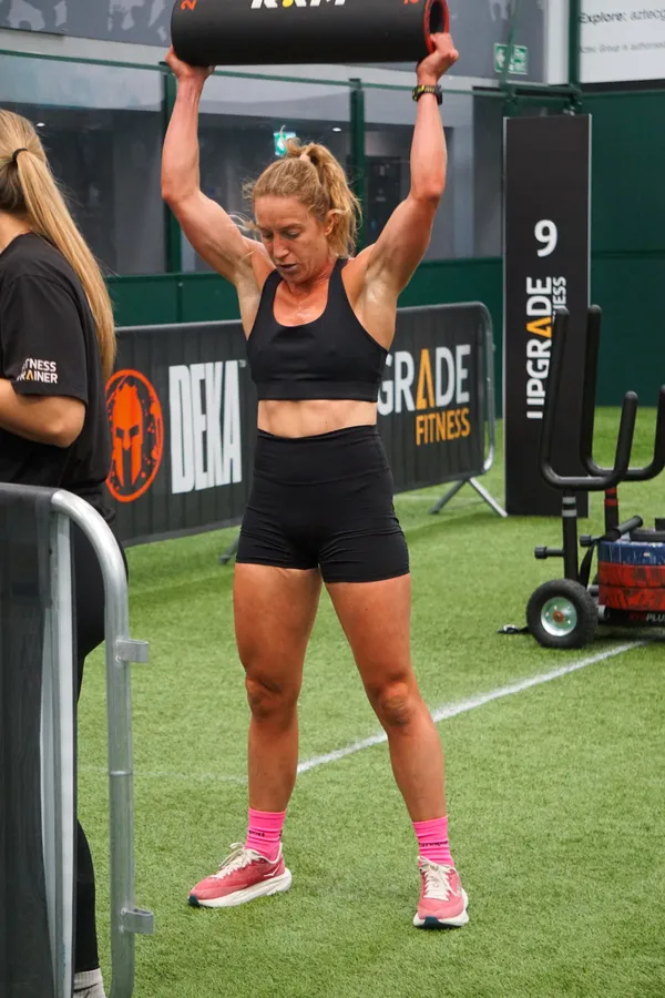 Katie Birch grinds out the last few weighted burpees.
