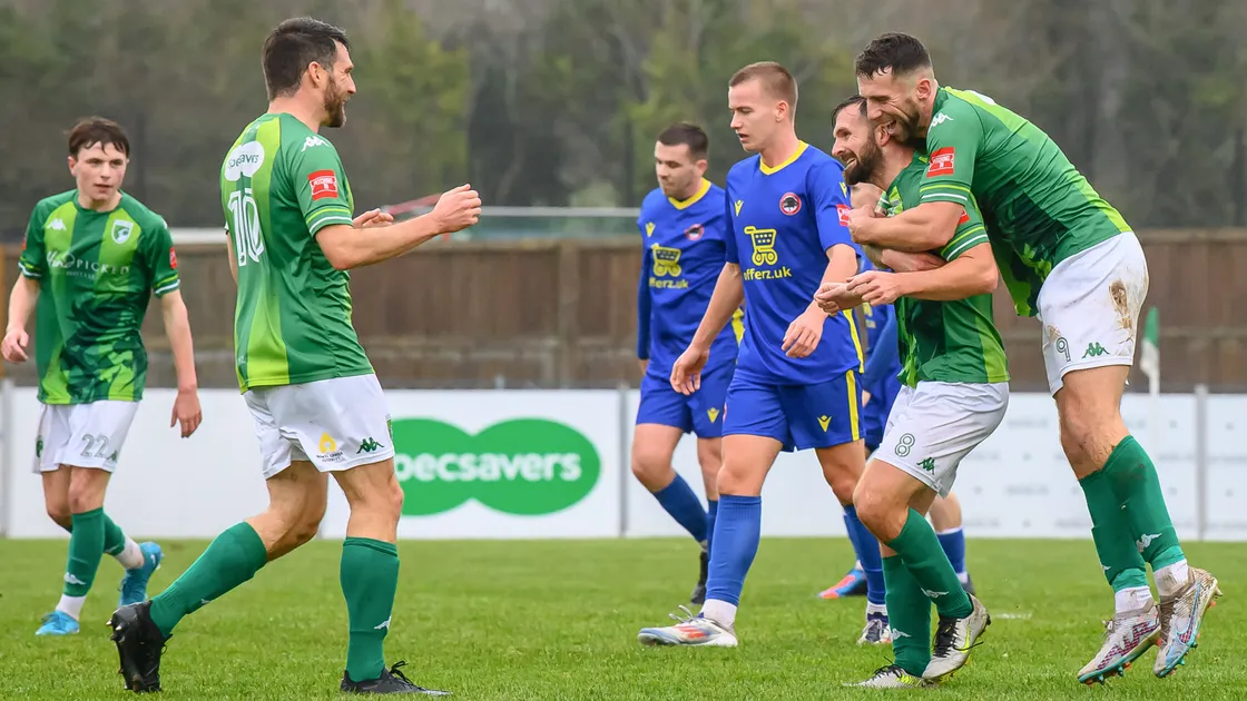 Sam Murray, who had scored the first two goals for Guernsey FC, hugs Matt Loaring after he added the third in the win over South Park on Saturday at Footes Lane. (Picture by Andrew Le Poidevin, 33893047)