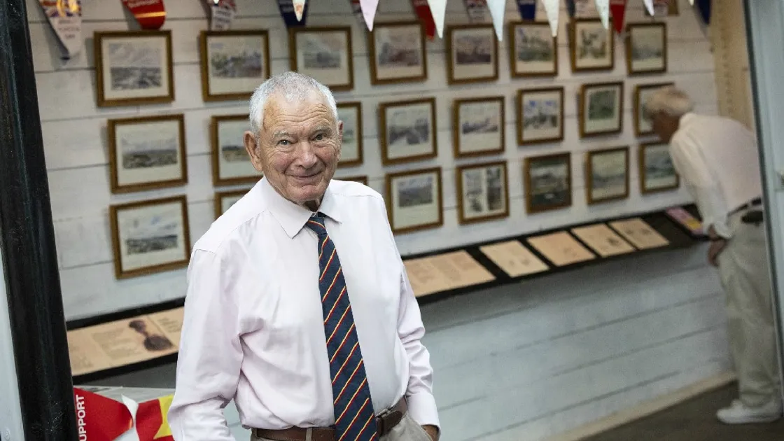 Bob Place of Royal British Legion Guernsey Welfare team at the exhibition showcasing the work of Colonel Valentine Rodolphe Burkhardt, DSO OBE RA, in the Inner Street at the Market.				