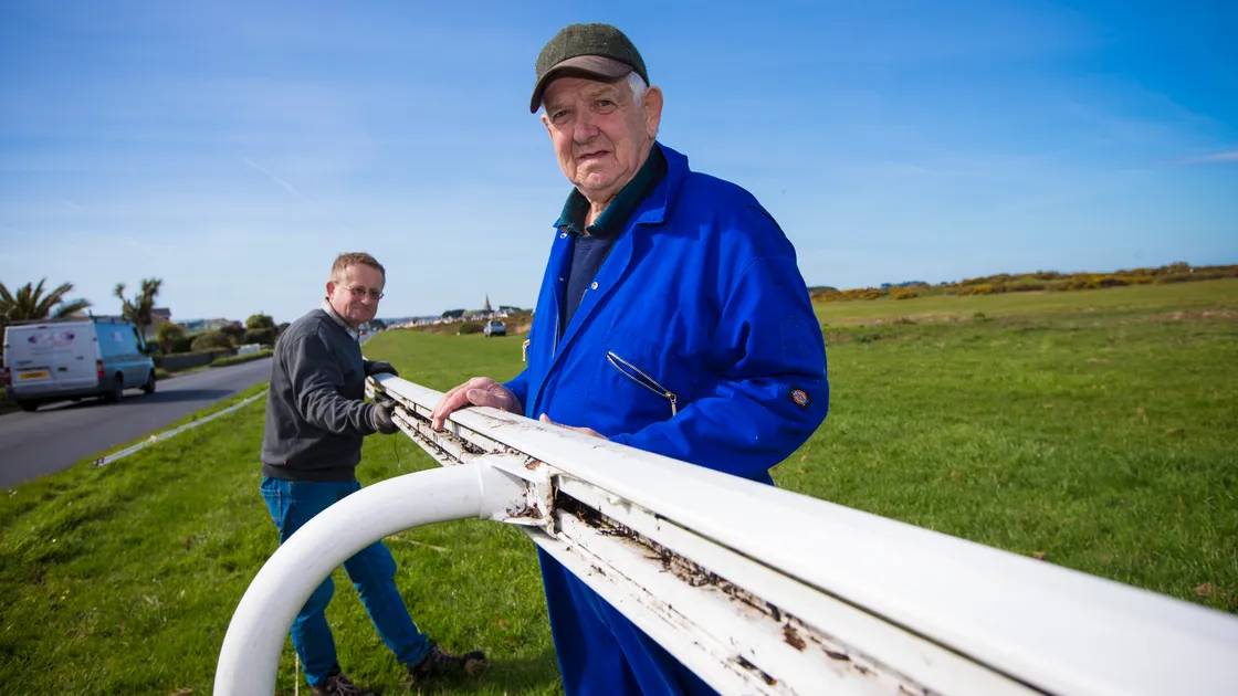 Jim Jamouneau, right helping Thady Griffith put up the rails for a Guernsey Race Club meeting. (Picture by Peter Frankland, 29640239)