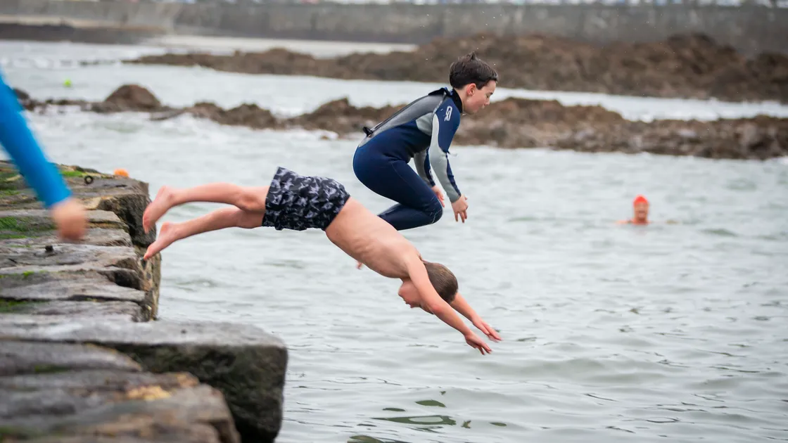 Alfie Rosamond, 8, left, and Teddy Prout-Harsetion, 10, took the quick way to get into the sea.  (Pictures by Luke Le Prevost, 31629473)