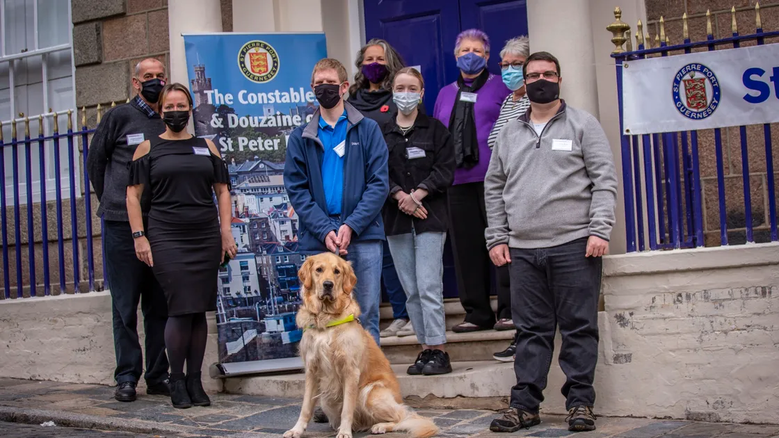 Drop-in at St Peter Port Constables Office on Saturday. Candidates, left to right are Anthony Holland, Evita Bormane, Simon de la Mare, Zoe Lihou, Charlotte Long, Jennifer Tasker (school committee), Diane Mitchell and Tom Moore. (Picture by Sophie Rabey, 30193413)