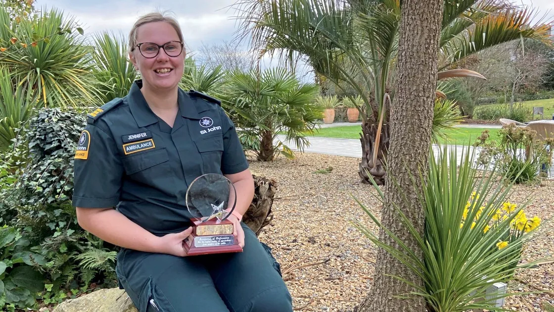Emergency medical technician Jen Lindfield with her special award for receiving the highest number of messages of thanks from islanders. 