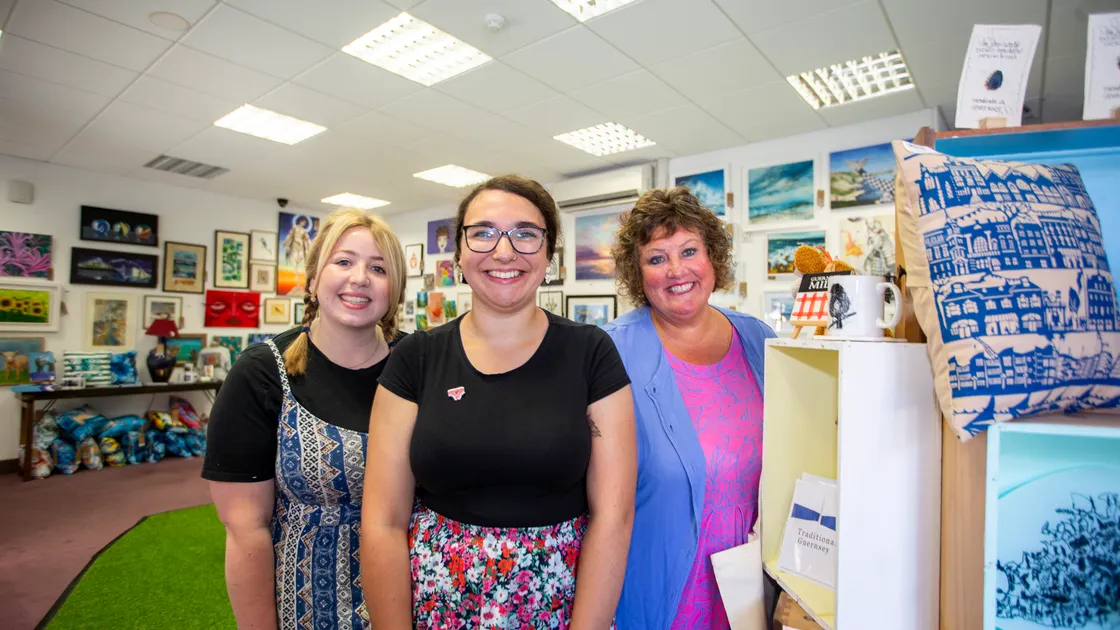 Iris & Dora’s Lauren De Jersey, left, and Lydia Tedde, centre, with Angie Tolcher of the Guernsey Art Network. (Picture by Luke Le Prevost, 31139172)