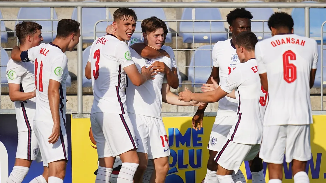 Alex Scott celebrates with his teammates after scoring a 58th-minute equaliser against Italy. (Picture from England Football)