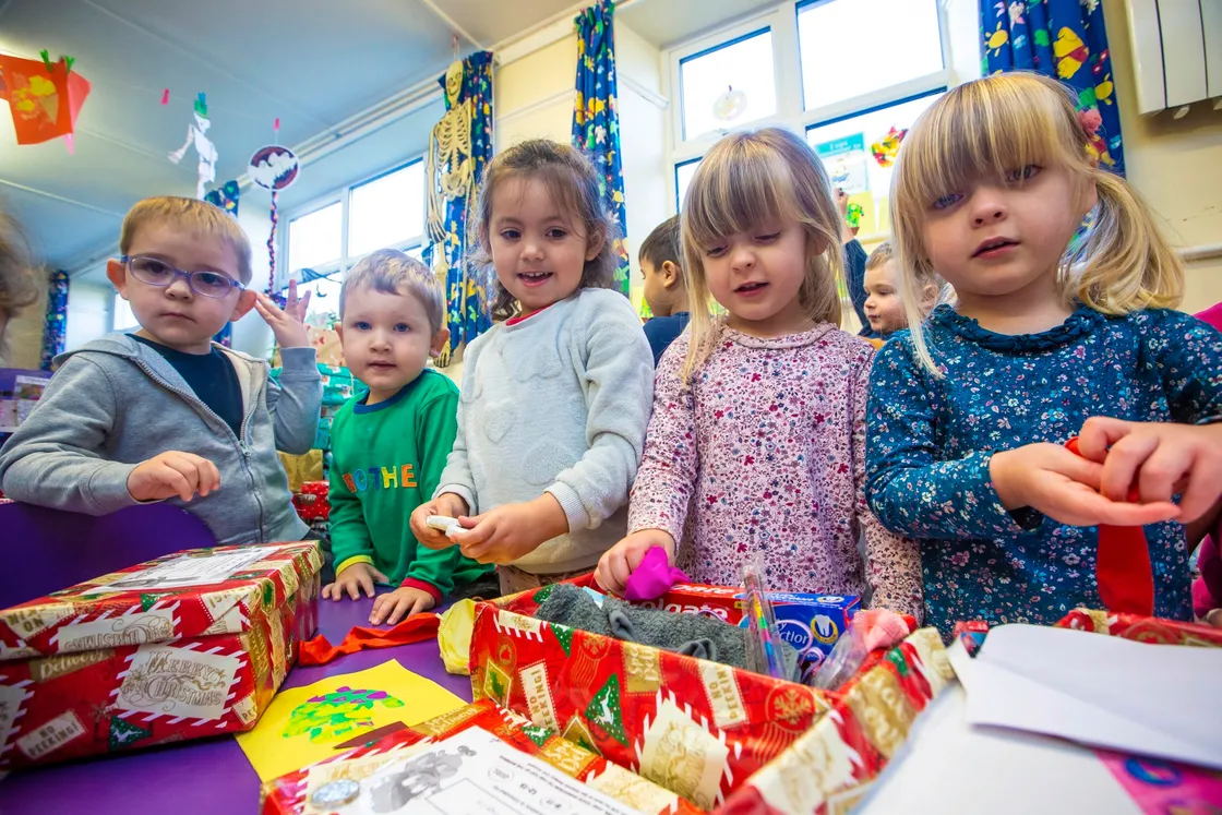 Picture by Peter Frankland. 02-11-20 Children at Little Learners Nursery have been helping to pack shoeboxes to be sent to third world countries..They have been helped by members of law enforcement, Just Games and other small businesses. L-R - Rafe Baker, 3, Tyrian Cohu, 2, Summer Garnham, 4, Maggie Broomfield, 3 and Alexa Broomfield, 3.. (28867660)