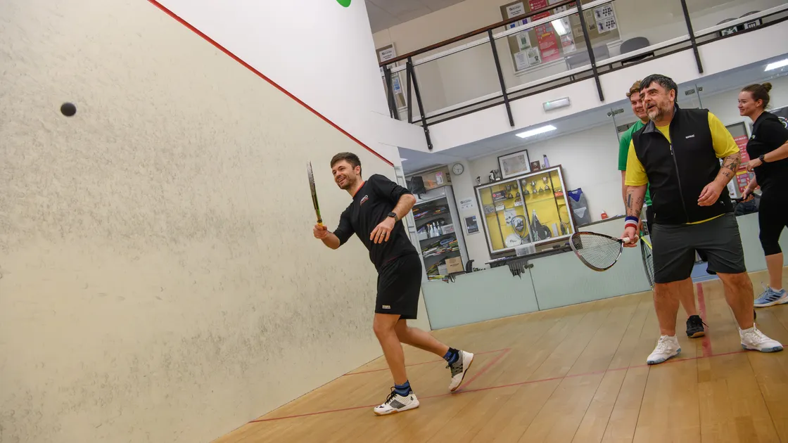 Multiple British racketball champion Mike Harris taking a coaching session for local players at Beau Sejour last weekend