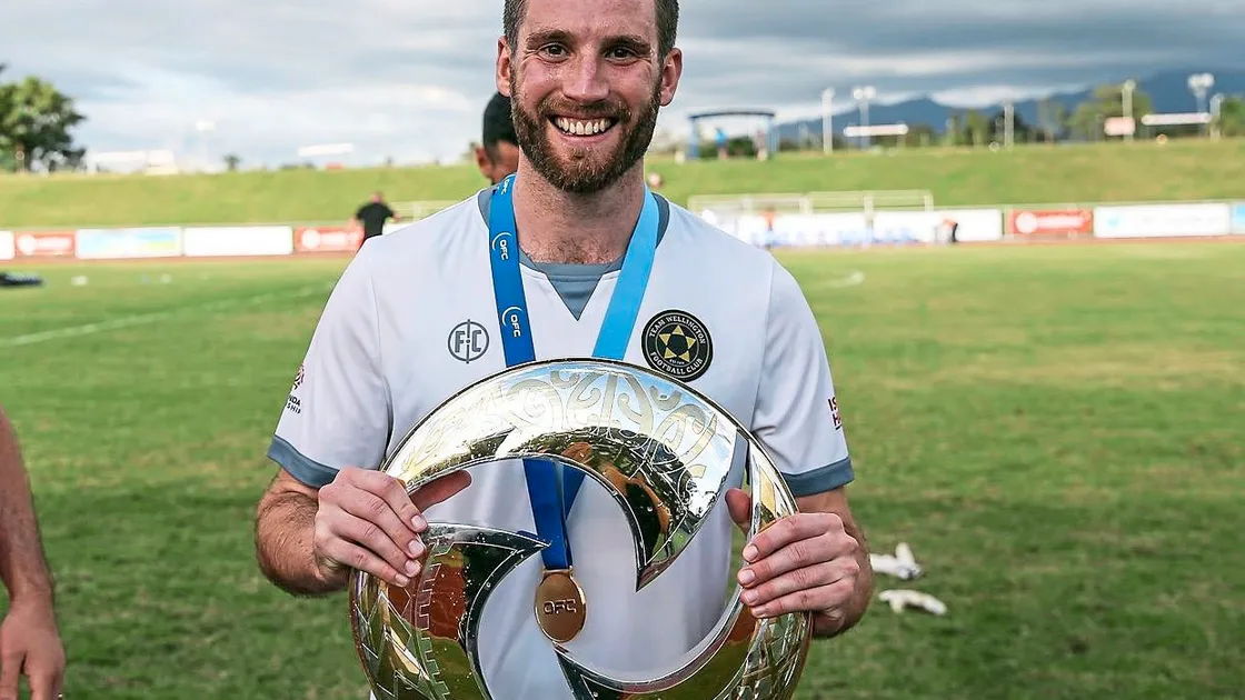 Ross Allen poses with the Oceania Champions League Trophy. (Pictures by Shane Wenzlick / www.phototek.nz., 21514622)