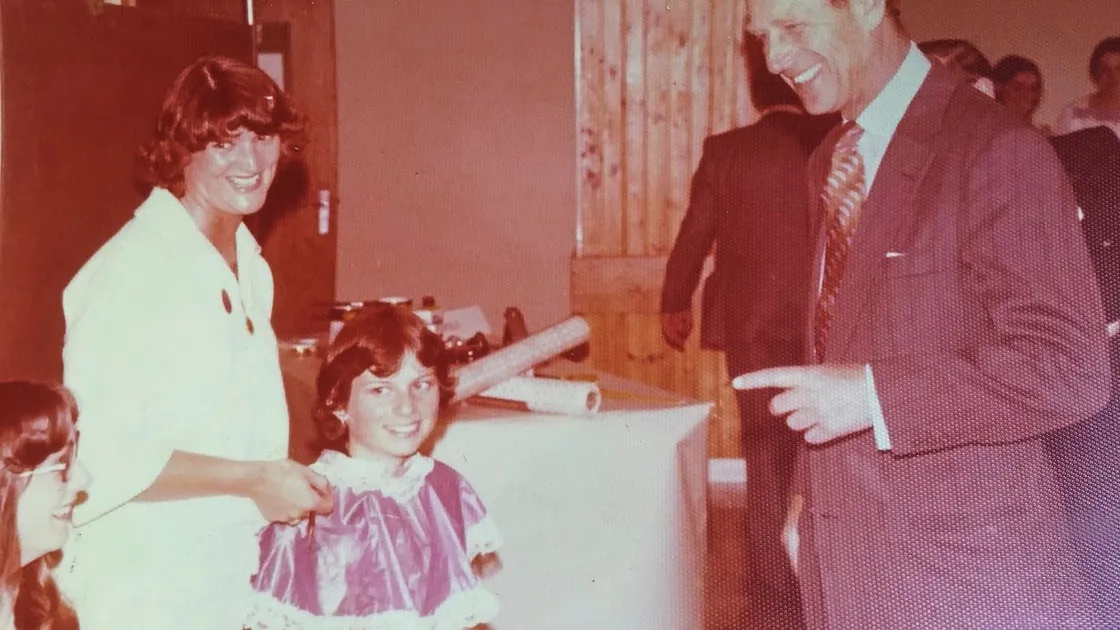 Deborah Gallienne-Ward met Prince Philip during his and the Queen’s visit to La Mare De Carteret Secondary School in 1978. Standing is Pat Janes, who was showing her how to apply make-up as part of the DofE award scheme.