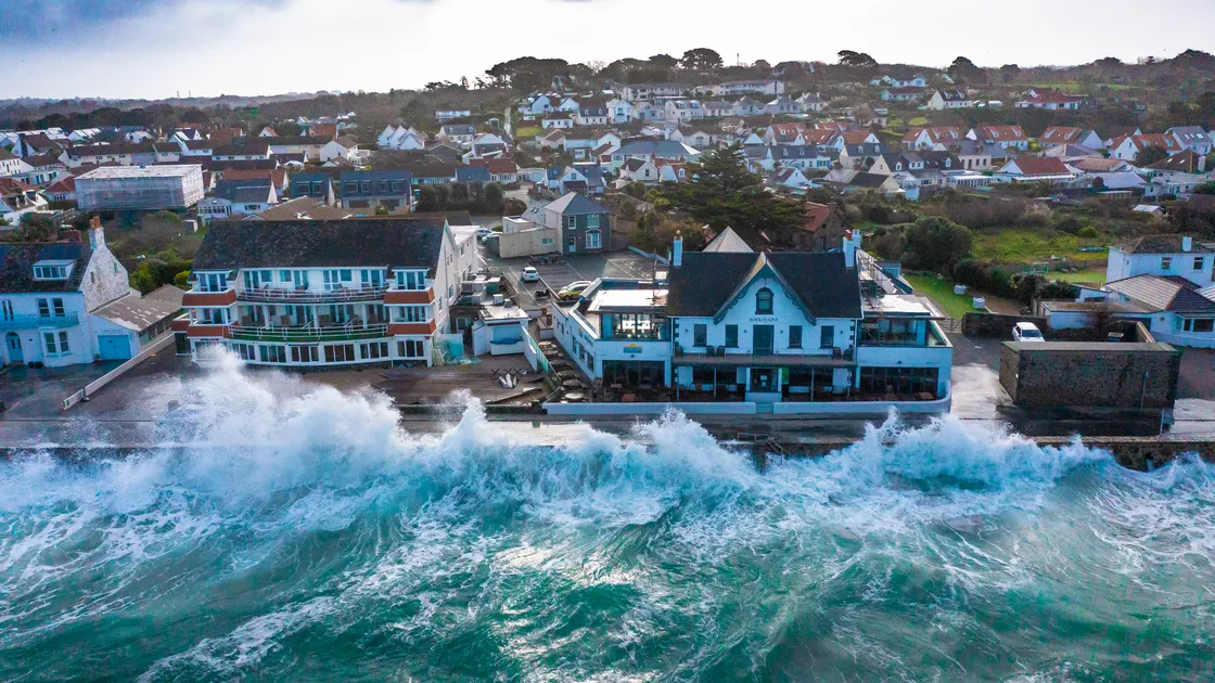 The scene at Cobo Bay yesterday morning. There was extensive flooding along some of the coast roads. (Picture by Peter Frankland, 31936360)