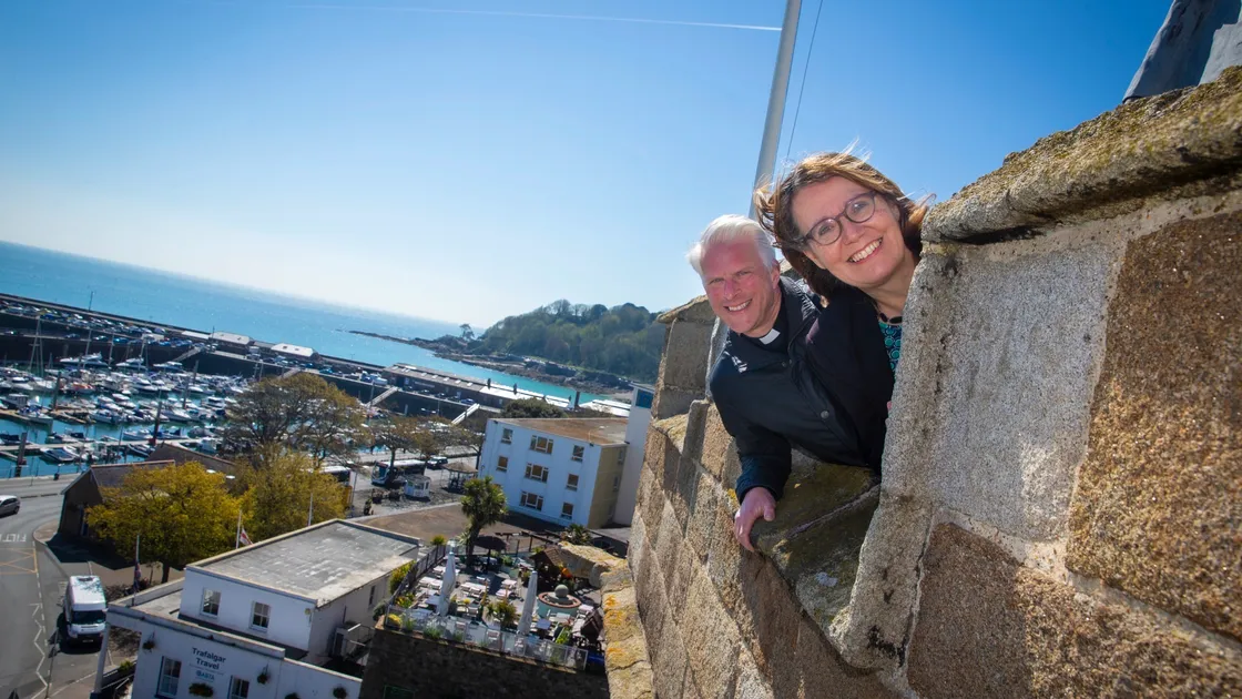 Rector the Rev. Matthew Barrett and choir soprano Kate Swan hope Saturday’s 8am performance from the Town Church tower will draw a large crowd. (Picture by Peter Frankland, 29485851)