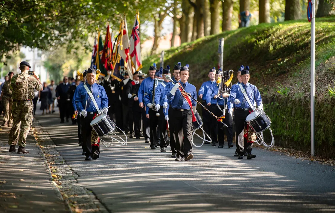 The standard bearers marched behind the Boys’ Brigade band from the Ladies’ College to Le Foulon for the service.