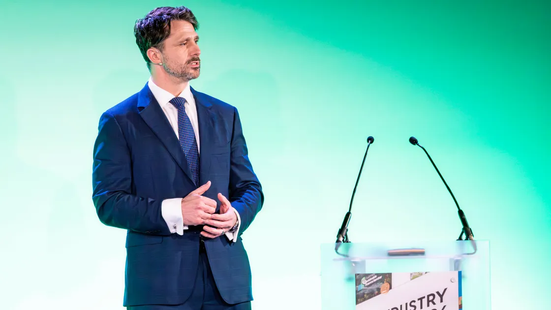 Guernsey Finance’s new chief executive Barnaby Molloy on stage at Beau Sejour yesterday