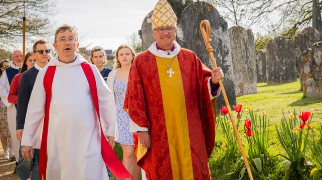 Bishop steps down during financial audit