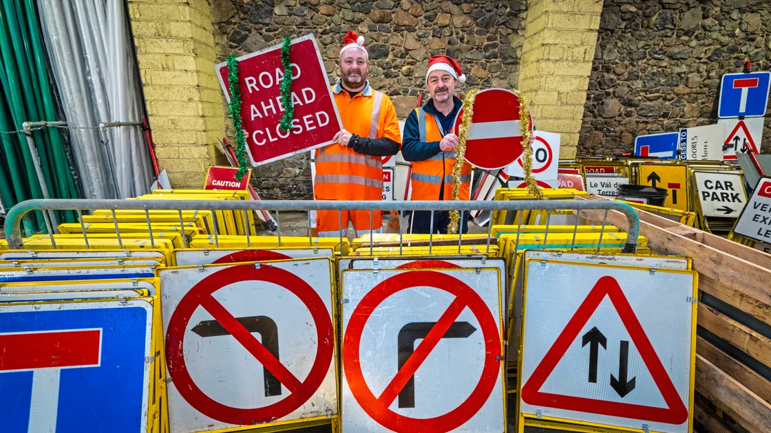 Signs and lines supervisor Andy Brown, left, and service manager Milton Le Moignan surrounded by some of the road signs in storage over the quiet Christmas period
