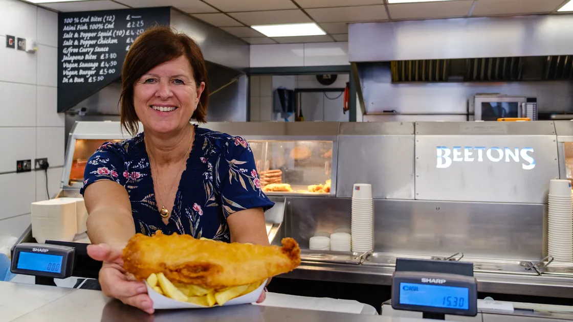 Kim Ashplant srves one of her last fish and chips.
