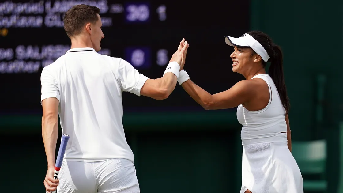 Joe Salisbury and Heather Watson during their mixed doubles match on day seven of the 2023 Wimbledon Championships at the All England Lawn Tennis and Croquet Club in Wimbledon. (Picture by John Walton/PA Wire, 32294339)