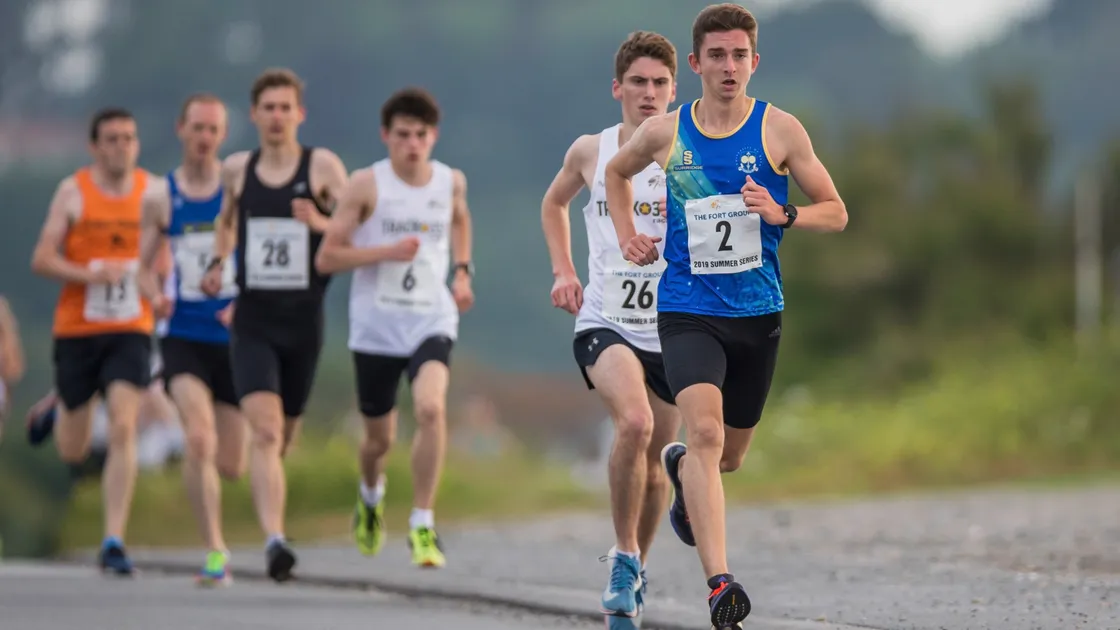 Eventual winner Richard Bartram sits on the shoulder of Alex Rowe during Tuesday's Vazon Mile. (Picture by Martin Gray, 25050762)