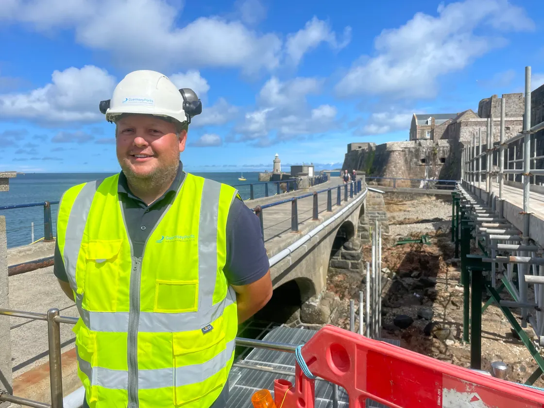 Guernsey Ports project civil engineer Joe Armstrong next to Castle Bridge which will be closed from 7 September for about nine months. On the right is the temporary bridge that will carry essential utlities and provide access for contractors and emergency services.