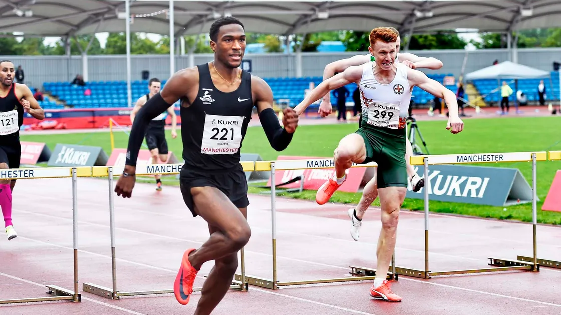 Alastair Chalmers (299) on his way to winning the men's 400m hurdles at the England Athletics Championships in Manchester. Efekemo Okoro (221) finished second. (Picture by Mark Shearman, 25372257)