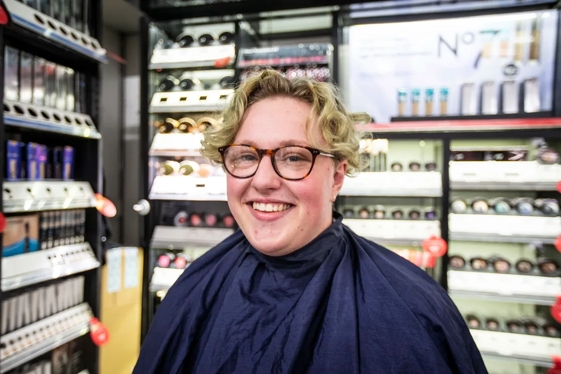 Picture by Sophie Rabey.  04-09-20.  Boots Charity Event Sponsored by All Beauty..The staff in store will be raising money for their chosen local charities buy opting to do a head/beard shave or leg/chest waxing..Courtney Le Moigne from All Beauty cutting Ezra Le Page's hair who is raising money for Guernsey Alzheimer's Association.  BEFORE. (28653418)