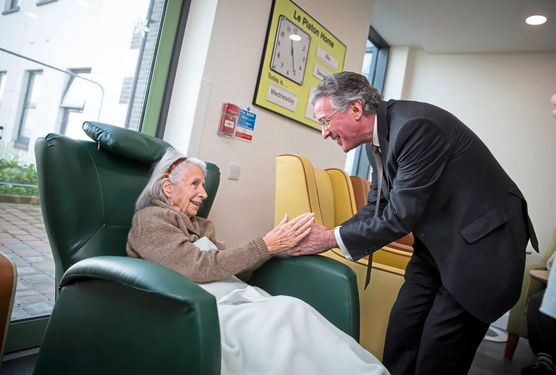 Bailiff Sir Richard McMahon meets Margaret 'Peggy' Robinson, who is Le Platon's oldest resident at 103. (Picture by Peter Frankland, 32822154)