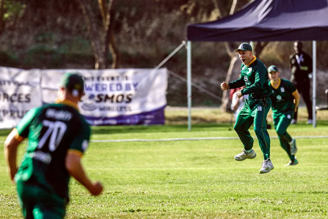 Guernsey captain Ollie Nightingale celebrates a wicket.