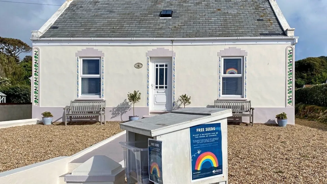 Dave Smart of Guernsey Electricity's, wildflower seed stall.