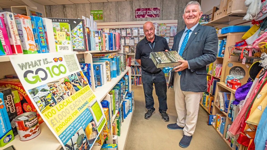 Lt-Governor Sir Richard Cripwell visiting the GO Charity Shop, pictured with general manager Michael Bougourd.