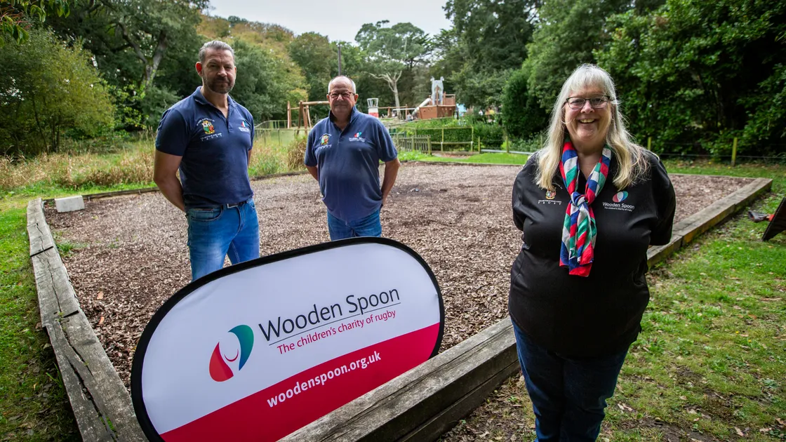 Wooden Spoon chairwoman Karen Solway with Martyn Renouf, left, and Peter Le Masurier.