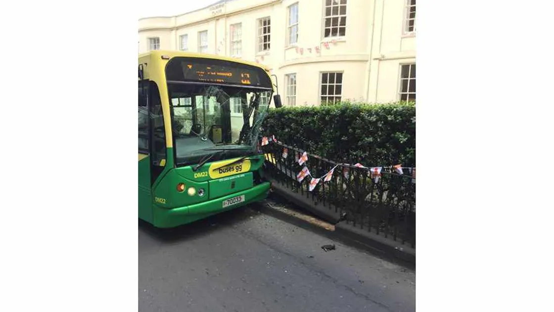 Bus collides with railings