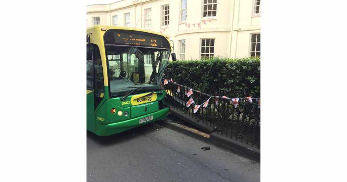 Bus collides with railings