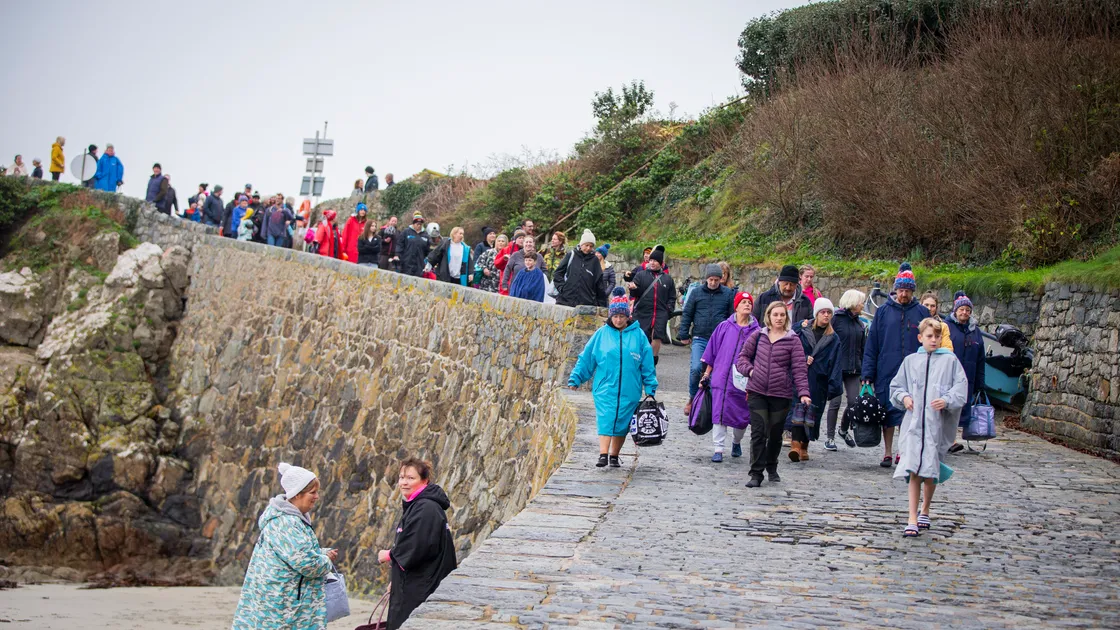 The swimmers walked down the slipway at Portelet before taking the plunge. (31629461)