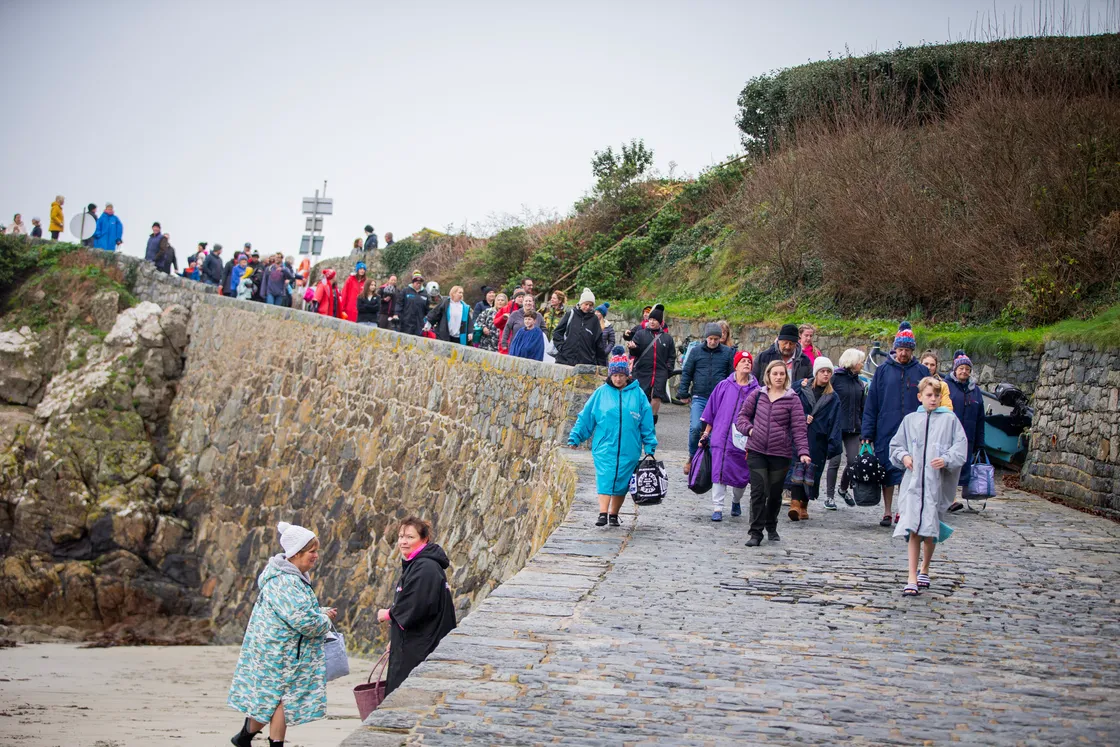 The swimmers walked down the slipway at Portelet before taking the plunge. (31629461)