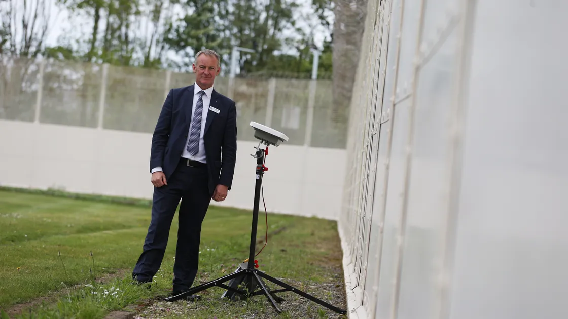 Prison governor Dave Matthews alongside part of the Sky Fence technology. (Picture by Peter Frankland, 20246985)