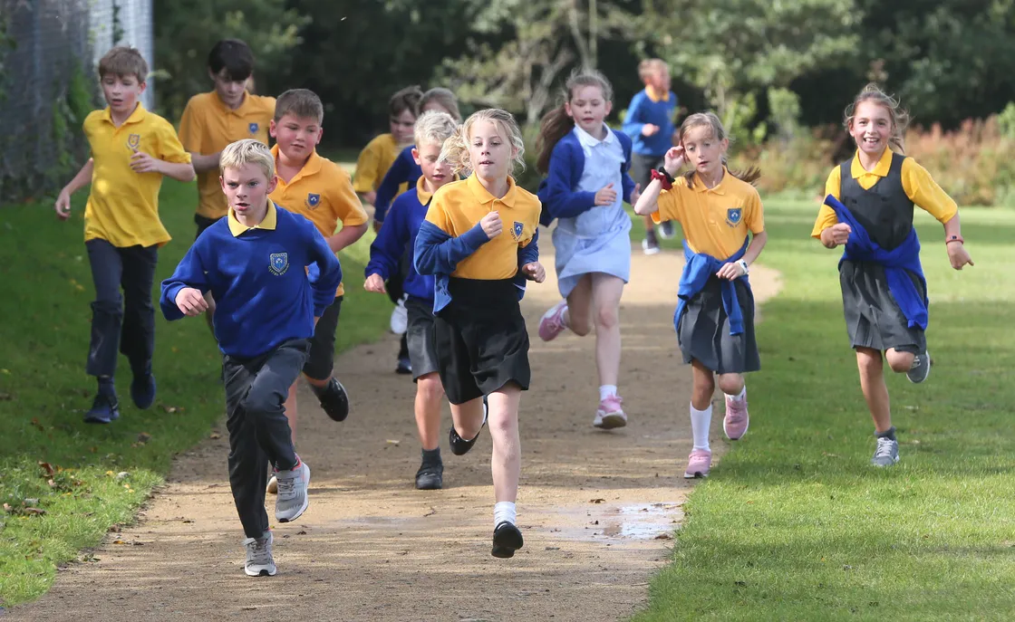 The daily mile, as seen being run by Castel School pupils in 2019, is highlighted as a positive in the support for health and wellbeing inschools. (Picture by Adrian Miller, 29285982)