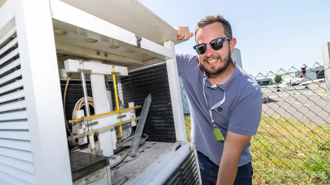 Guernsey Met Office’s James Wilson checks the thermometers at Guernsey Airport as they hit new highs yesterday.