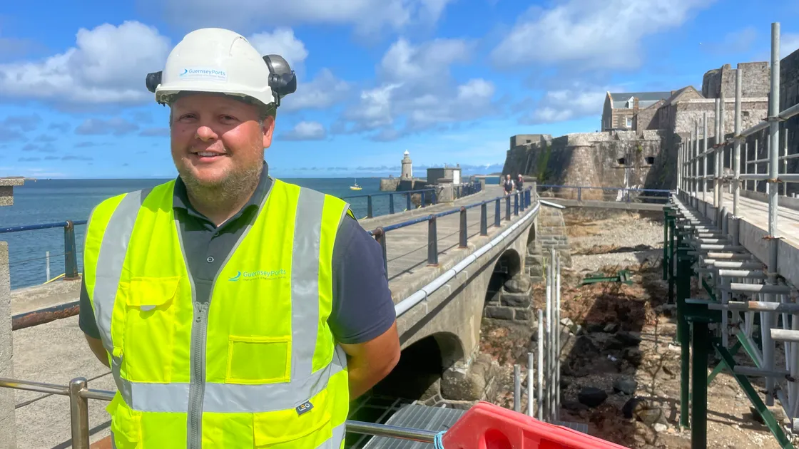 Guernsey Ports project civil engineer Joe Armstrong next to Castle Bridge which will be closed from 7 September for about nine months. On the right is the temporary bridge that will carry essential utlities and provide access for contractors and emergency services.