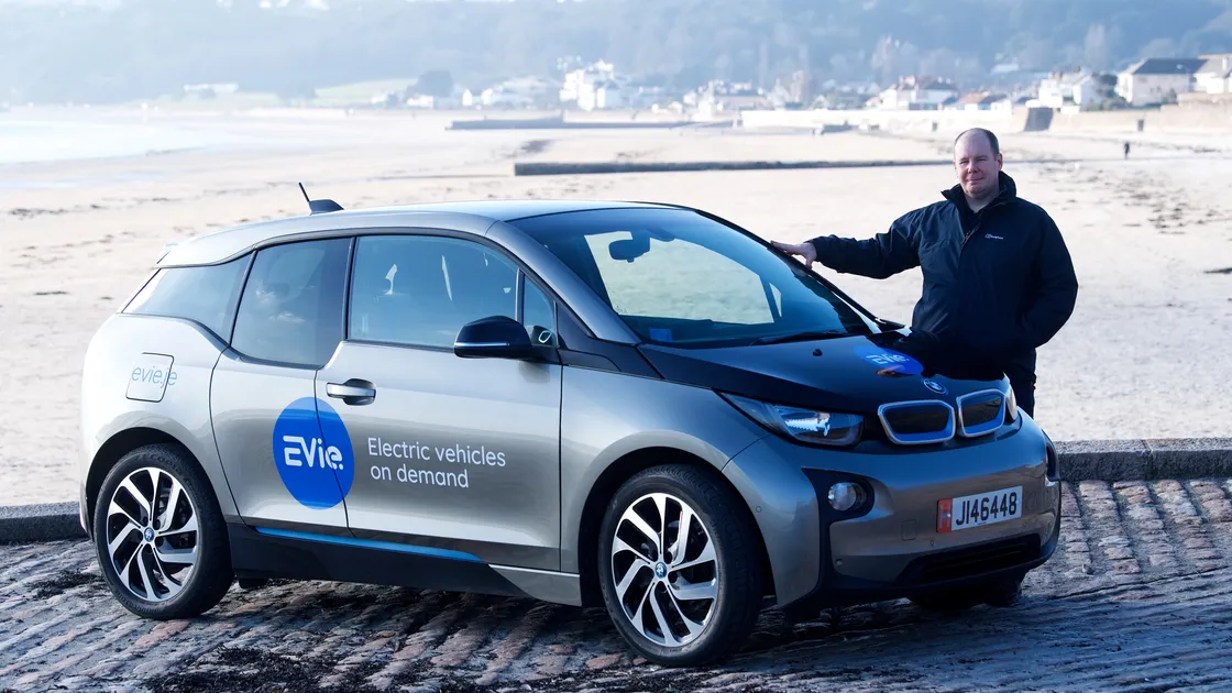 EVie is the name of the new on-demand electric car sharing scheme in Jersey. The company’s Andrew Ruellan is seen with one of its vehicles. (Picture by Jon Guegan, 26972181)