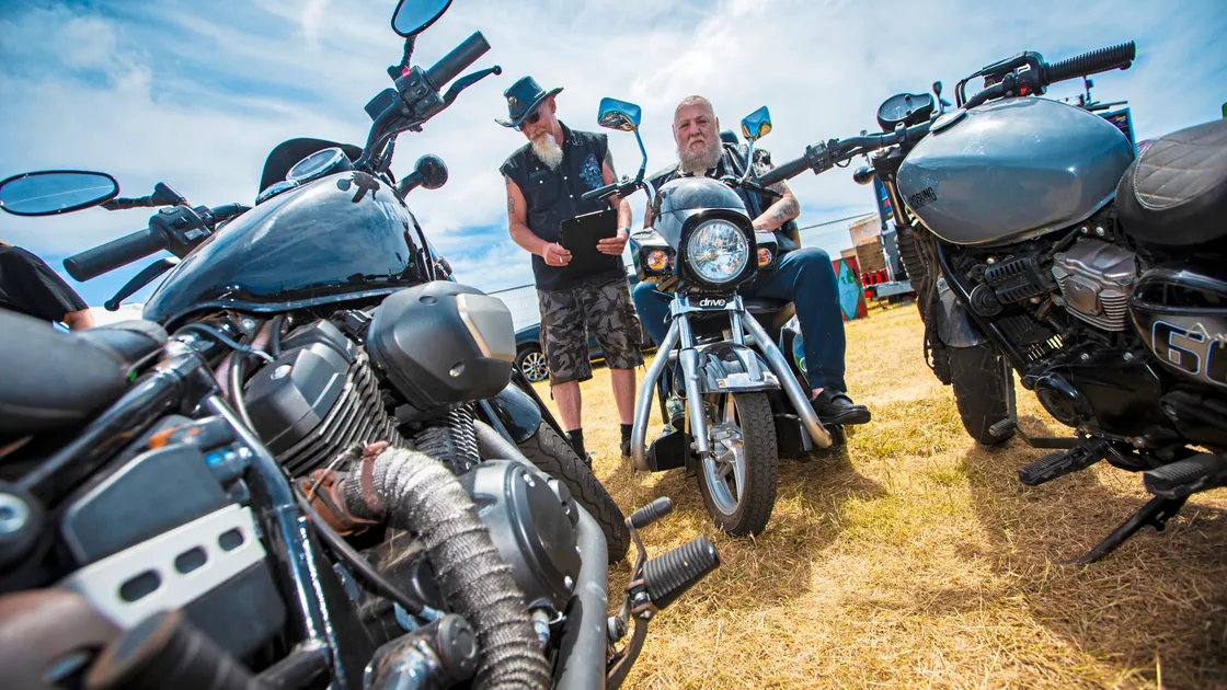 Nick Carvell, left, and ‘Chiv’ undertaking the serious business of judging the motorbikes. (33376804)