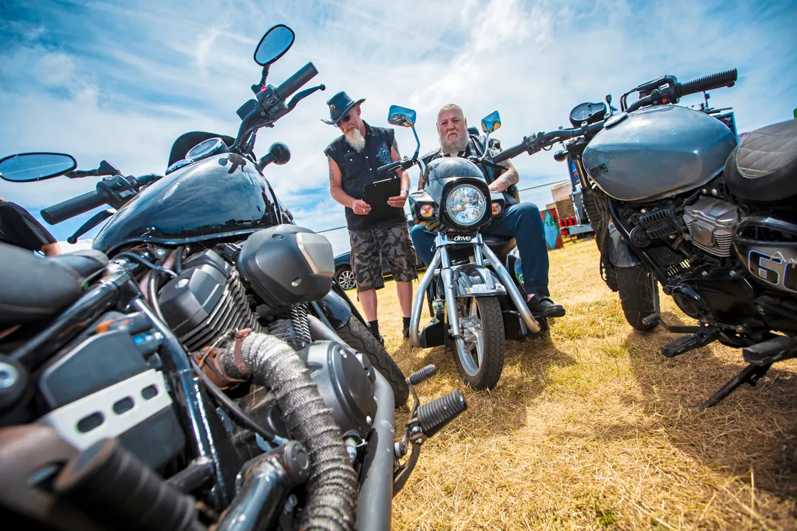 Nick Carvell, left, and ‘Chiv’ undertaking the serious business of judging the motorbikes. (33376804)